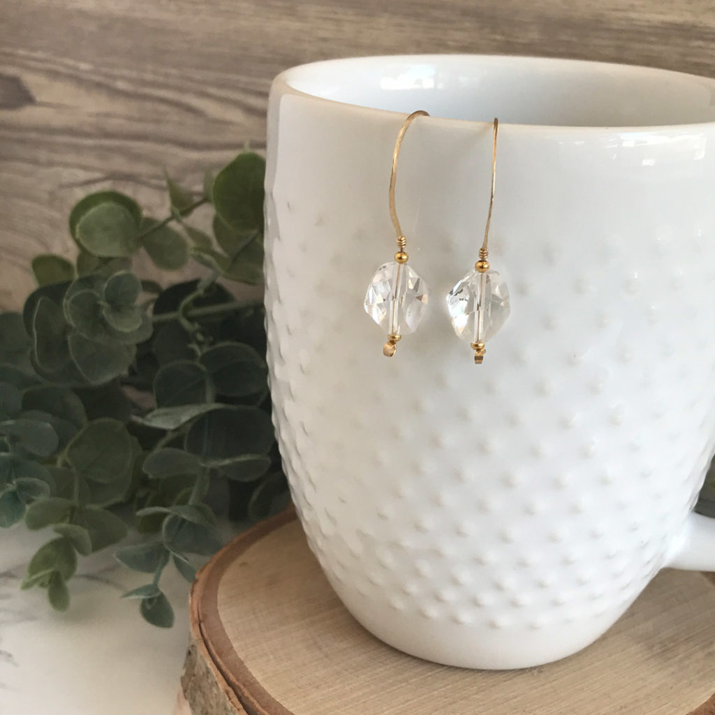 Modern style long gold ear wire earrings with faceted chuck crystal